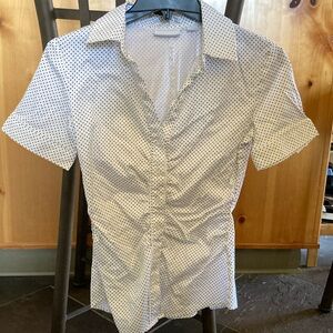 Tailored white with black polka dot blouse